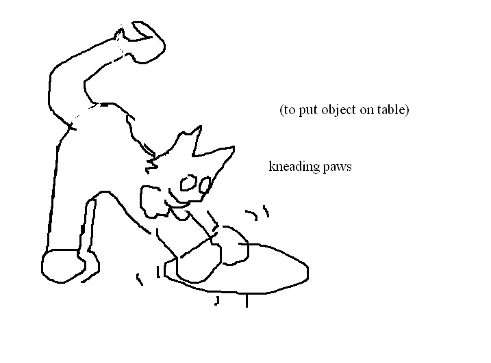 pluey putting object on very low table by kneading paws (object is not seen)